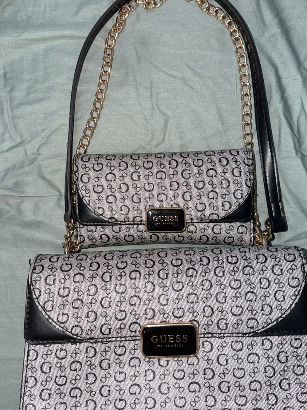 GUESS Gray Monogram Crossbody Bag with Black Trim and Gold Chain